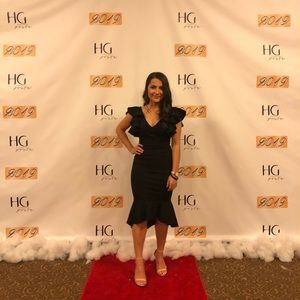 Flattering Black Dress with Ruffled sleeves.